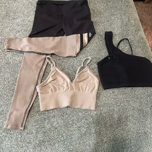 ALO Yoga Black and Tan Activewear Set and spiritual gangster workout bra.